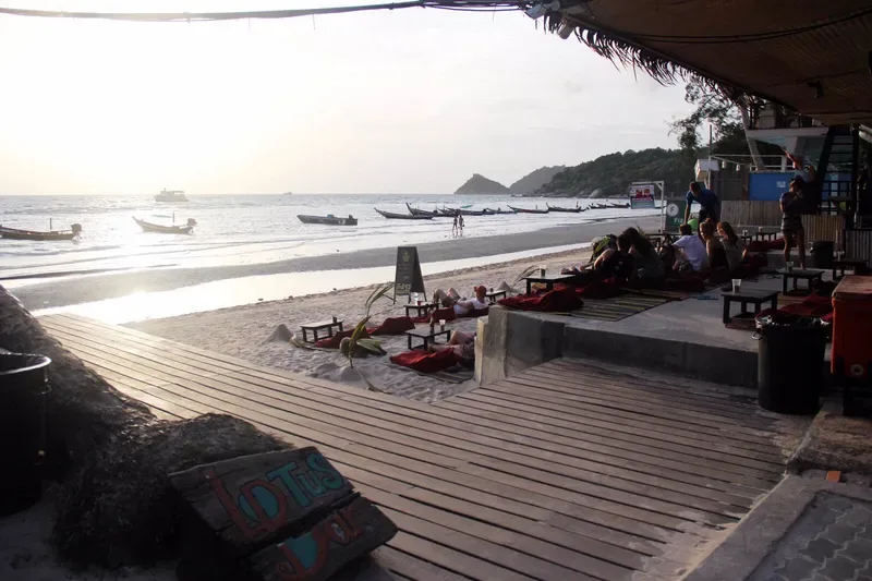 Beach lounge with bean bags at golden hour