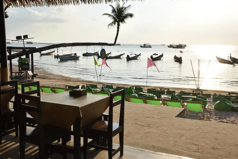 Beachfront restaurant table looking out to sea