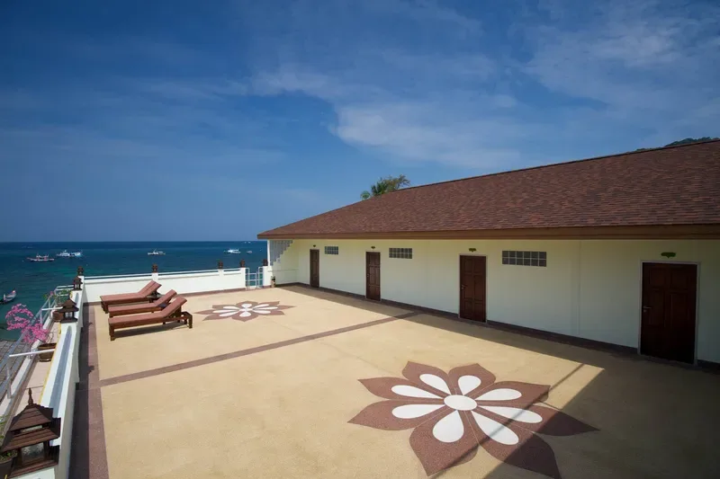 Rooftop sun terrace with sea view loungers